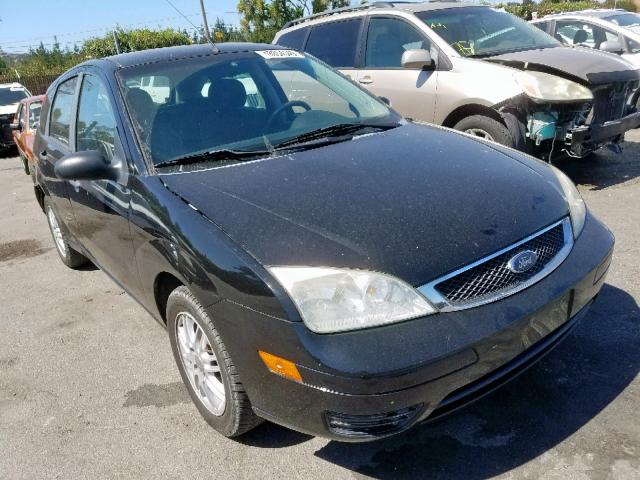 1FAFP37NX7W218355 - 2007 FORD FOCUS ZX5 BLACK photo 1