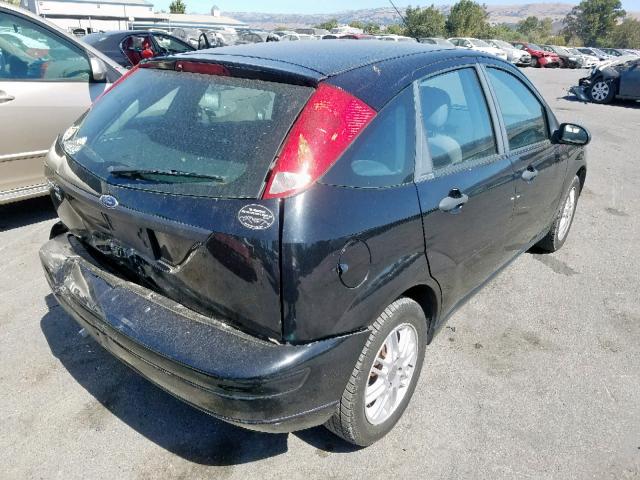 1FAFP37NX7W218355 - 2007 FORD FOCUS ZX5 BLACK photo 4