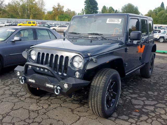 1C4BJWDG4HL655563 - 2017 JEEP WRANGLER U GRAY photo 2