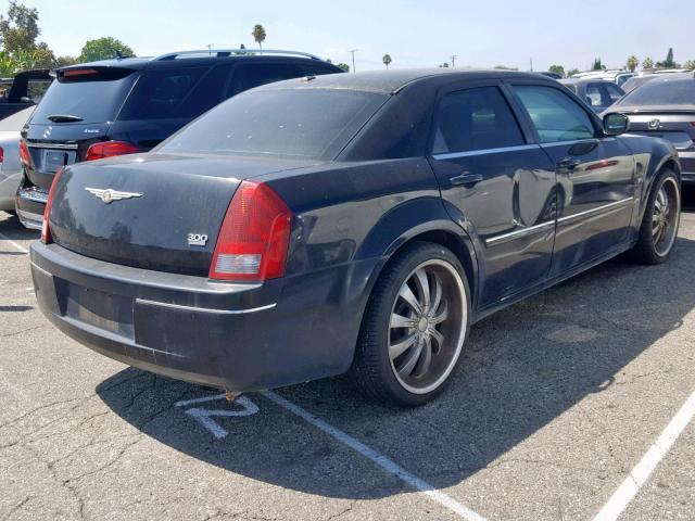 2C3KA53G36H538230 - 2006 CHRYSLER 300 TOURIN BLACK photo 4