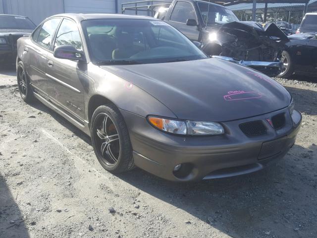 1G2WP52K81F159403 - 2001 PONTIAC GRAND PRIX GOLD photo 1