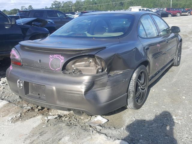 1G2WP52K81F159403 - 2001 PONTIAC GRAND PRIX GOLD photo 4