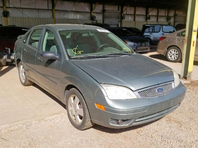 1FAFP34N45W232138 - 2005 FORD FOCUS ZX4 GRAY photo 1