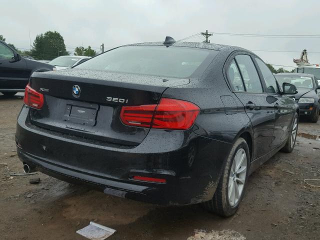 WBA8A3C54JA494994 - 2018 BMW 320 XI BLACK photo 4