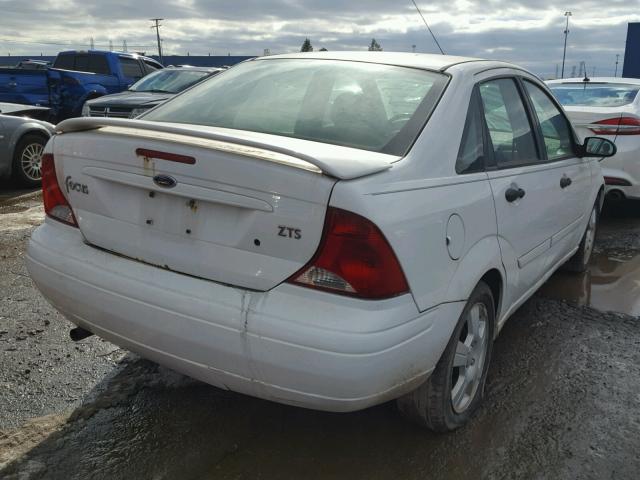 1FAFP38ZX4W144626 - 2004 FORD FOCUS ZTS WHITE photo 4