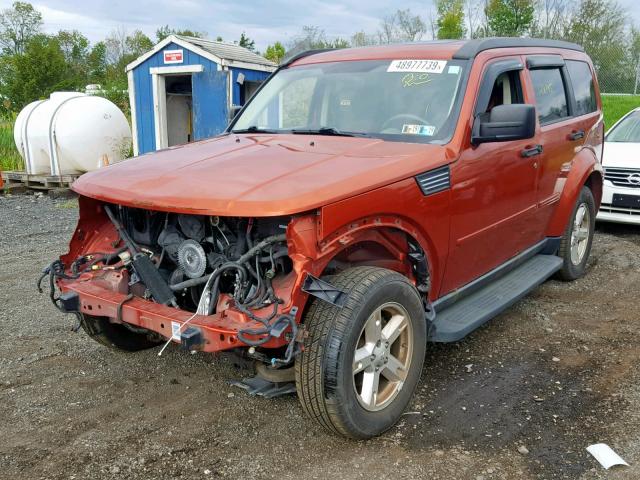 1D8GU58K47W608957 - 2007 DODGE NITRO SLT ORANGE photo 2