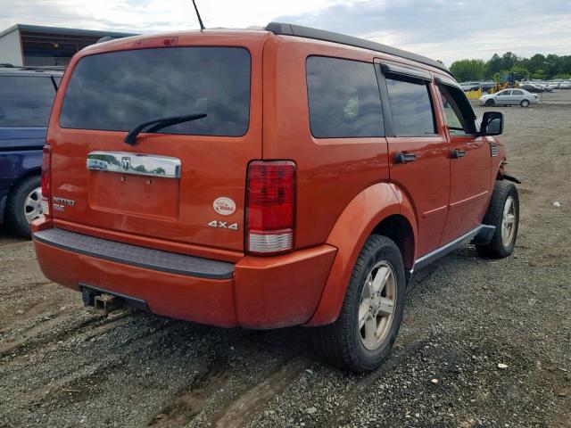 1D8GU58K47W608957 - 2007 DODGE NITRO SLT ORANGE photo 4