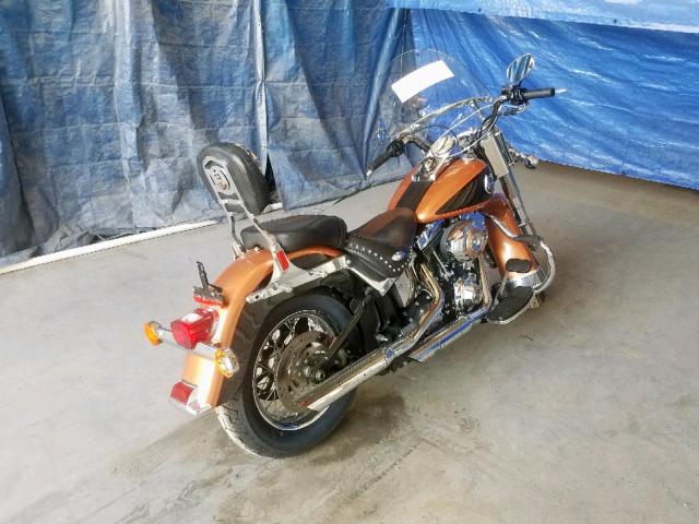 1HD1BW5418Y043917 - 2008 HARLEY-DAVIDSON FLSTC 105T ORANGE photo 4