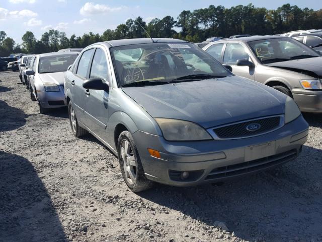 1FAFP34N45W304875 - 2005 FORD FOCUS ZX4 GREEN photo 1