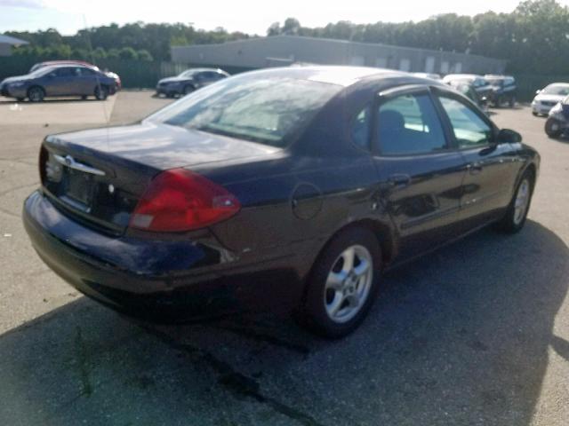 1FAFP55262A243649 - 2002 FORD TAURUS SES BLACK photo 4