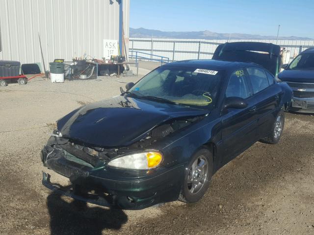 1G2NW52E22M726646 - 2002 PONTIAC GRAND AM G GREEN photo 2