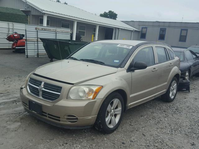 1B3CB4HA4AD586712 - 2010 DODGE CALIBER SX GOLD photo 2