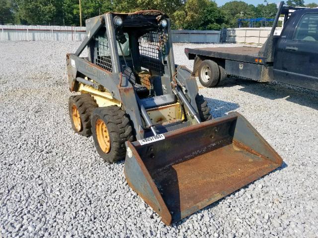 LMU23667 - 2004 NEWH SKIDSTEER YELLOW photo 1