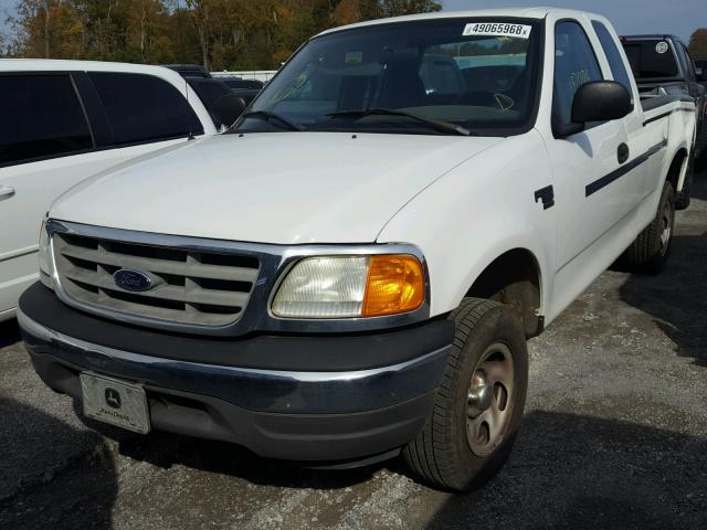 2FTRX18WX4CA91553 - 2004 FORD F-150 HERI WHITE photo 2