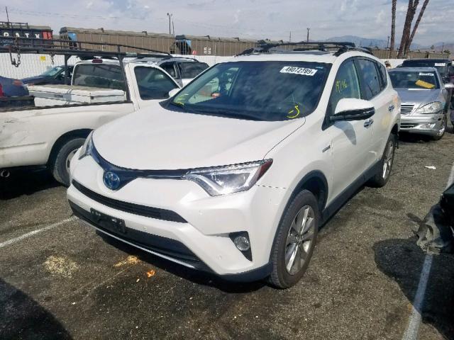 JTMDJREV6JD168470 - 2018 TOYOTA RAV4 HV LI WHITE photo 2