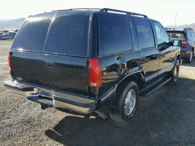 1GKEK13R5XJ769540 - 1999 GMC DENALI BLACK photo 4