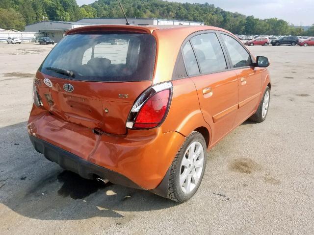 KNADH5A3XA6659053 - 2010 KIA RIO LX ORANGE photo 4