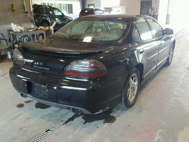 1G2WP52K41F117813 - 2001 PONTIAC GRAND PRIX BLACK photo 4