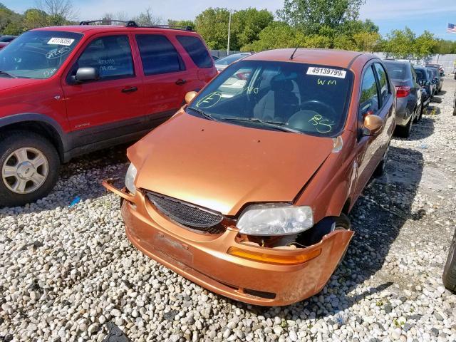 KL1TD56686B661211 - 2006 CHEVROLET AVEO BASE Narıncı foto 2