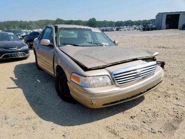 2FAFP74W7XX139945 - 1999 FORD CROWN VICT GOLD photo 1