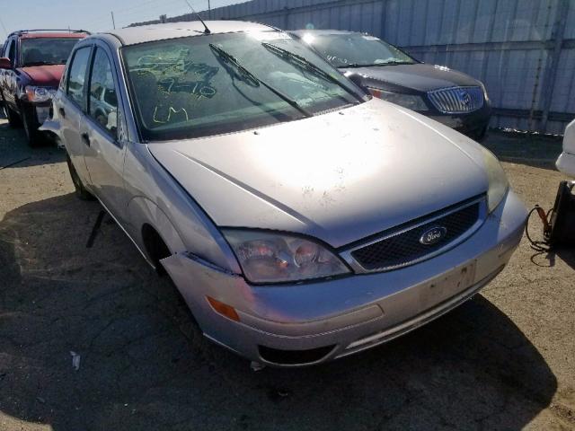 1FAFP34N75W153966 - 2005 FORD FOCUS ZX4 SILVER photo 1