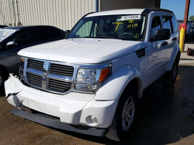 1D4PT2GK6BW602588 - 2011 DODGE NITRO SE WHITE photo 2