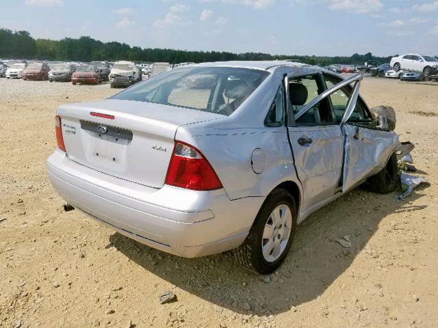 1FAFP34NX6W129033 - 2006 FORD FOCUS ZX4 GRAY photo 4