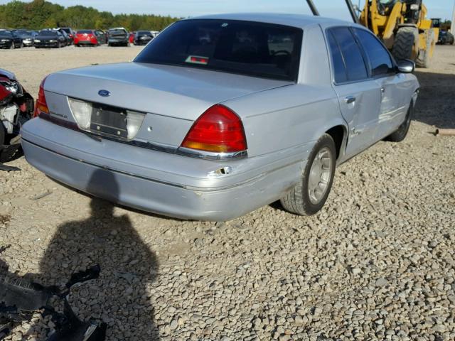 2FAFP74W5XX151401 - 1999 FORD CROWN VICT SILVER photo 4