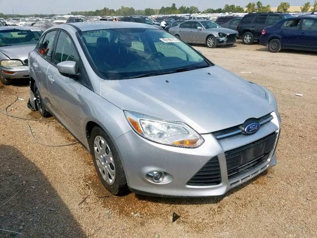 1FAHP3F23CL313268 - 2012 FORD FOCUS SE SILVER photo 1