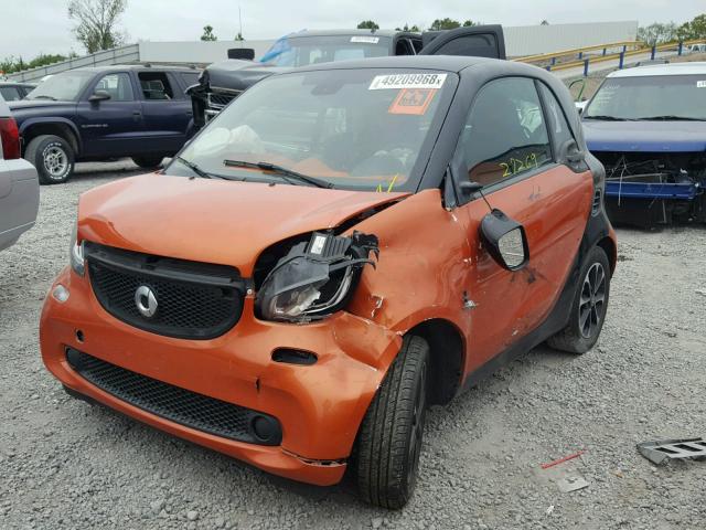 WMEFJ5DA1GK047156 - 2016 SMART FORTWO ORANGE photo 2