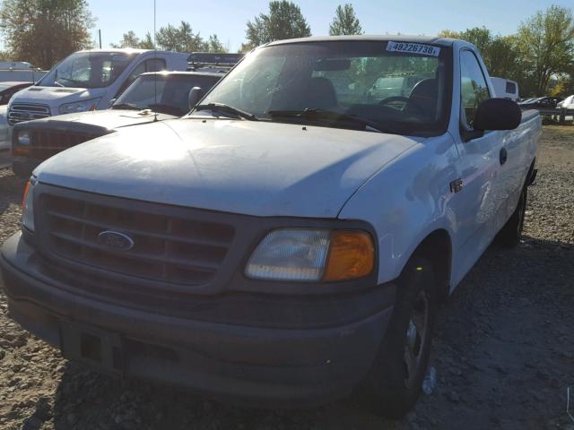 2FTRF17274CA64683 - 2004 FORD F-150 HERI GRAY photo 2