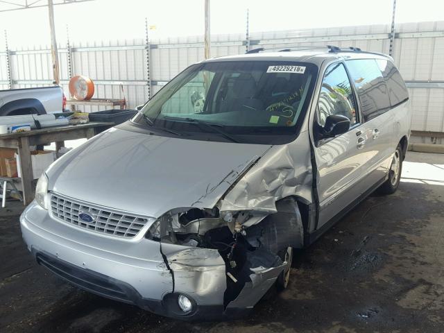 2FMZA57462BA53177 - 2002 FORD WINDSTAR S SILVER photo 2