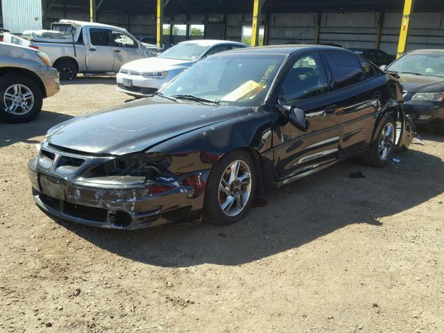 1G2NW52E02M693775 - 2002 PONTIAC GRAND AM G BLACK photo 2