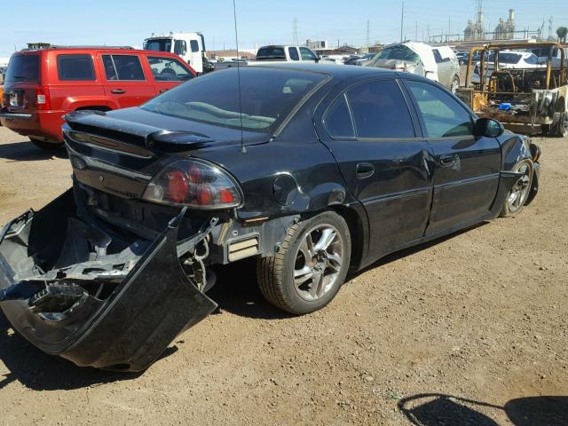 1G2NW52E02M693775 - 2002 PONTIAC GRAND AM G BLACK photo 4