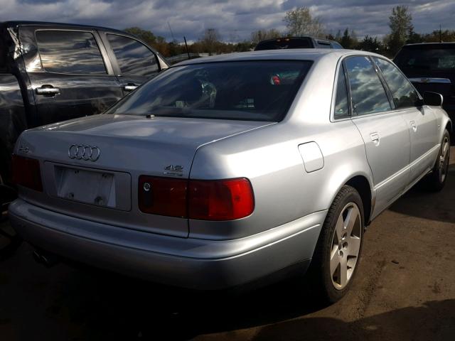 WAUBG34D7XN002695 - 1999 AUDI A8 QUATTRO BLACK photo 4