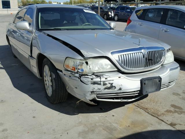 1LNHM81W34Y655569 - 2004 LINCOLN TOWN CAR E SILVER photo 1