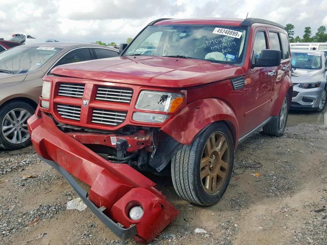 1D4PT4GK1BW604325 - 2011 DODGE NITRO HEAT RED photo 2