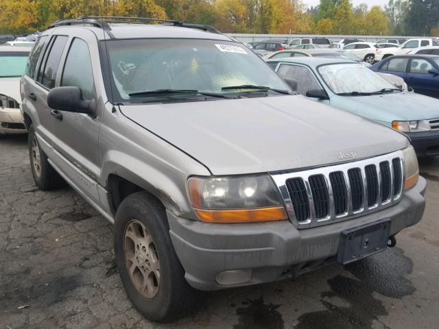 1J4GW58N6XC742724 - 1999 JEEP GRAND CHER TAN photo 1