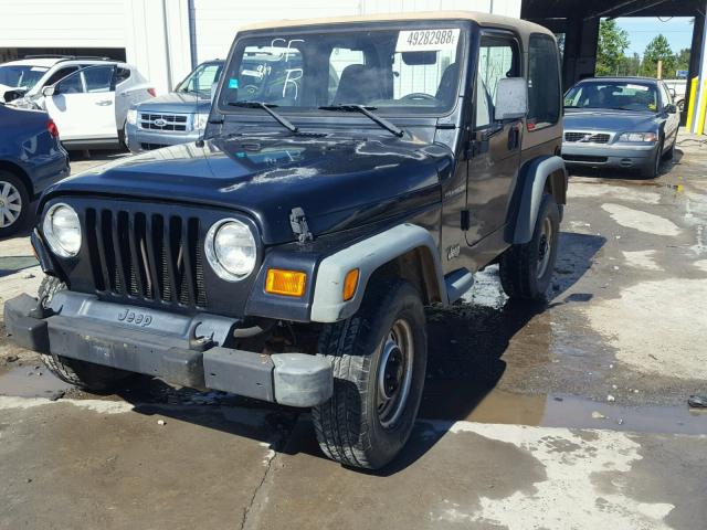 1J4FA29P0YP705638 - 2000 JEEP WRANGLER / BLACK photo 2