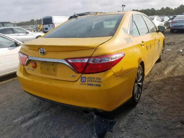 4T1BD1FK4FU148466 - 2015 TOYOTA CAMRY HYBR YELLOW photo 4