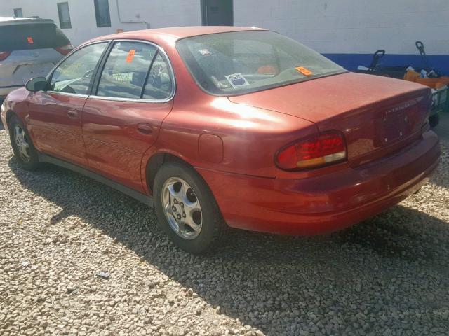 1G3WX52H4XF360059 - 1999 OLDSMOBILE INTRIGUE G RED photo 3