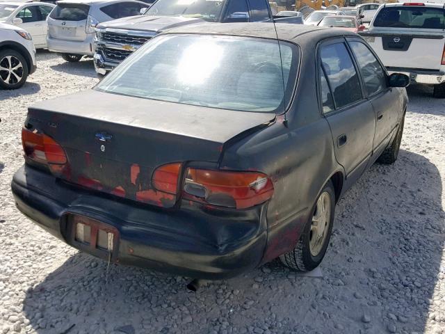 1Y1SK5287YZ413524 - 2000 CHEVROLET GEO PRIZM შავი ფოტო 4