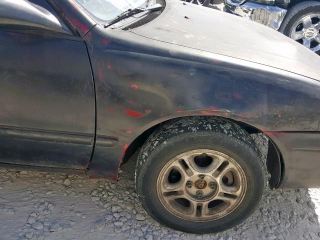 1Y1SK5287YZ413524 - 2000 CHEVROLET GEO PRIZM შავი ფოტო 9