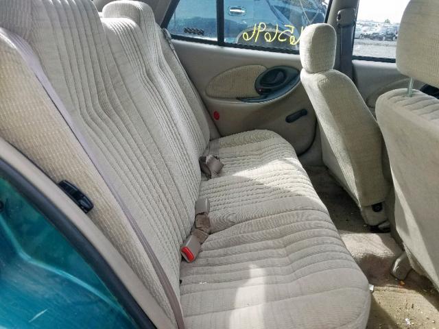 1G2NE52T7VC797739 - 1997 PONTIAC GRAND AM S GREEN photo 6