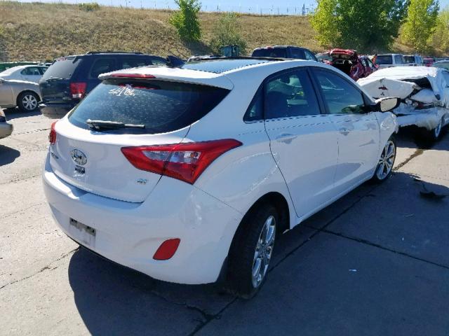 KMHD35LE0DU060769 - 2013 HYUNDAI ELANTRA GT WHITE photo 4