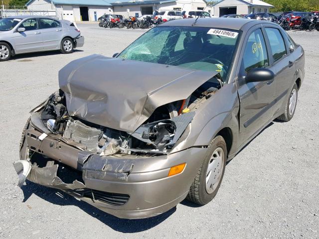 1FAFP33P63W186523 - 2003 FORD FOCUS LX TAN photo 2