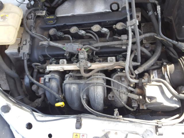 1FAFP34N35W207490 - 2005 FORD FOCUS ZX4 WHITE photo 7