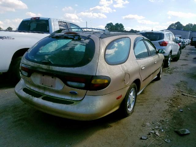 1FALP57U1VG124765 - 1997 FORD TAURUS GL GOLD photo 4