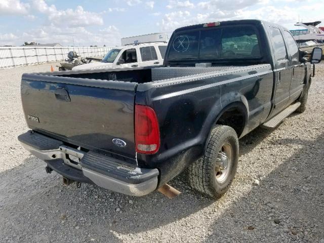 1FTSW30F82EA24405 - 2002 FORD F350 SRW S BLACK photo 4