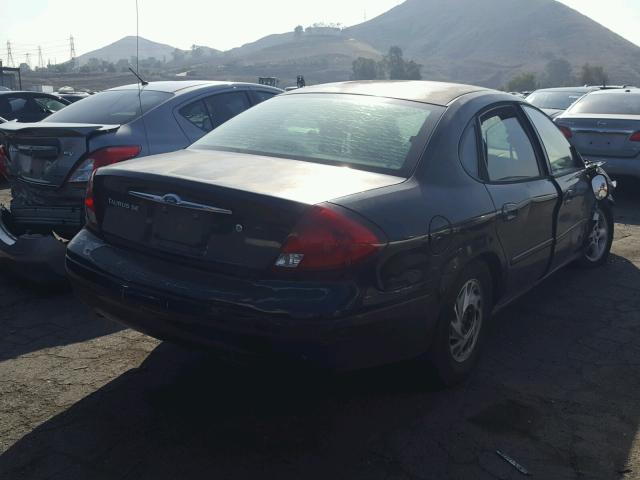 1FAFP55U0YA122609 - 2000 FORD TAURUS SES BLACK photo 4